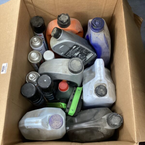 Mixed lot of motor oil and spray paint cans for automotive and DIY use.