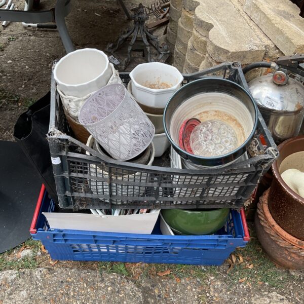Mixed lot of vintage and plastic plant pots for garden use.