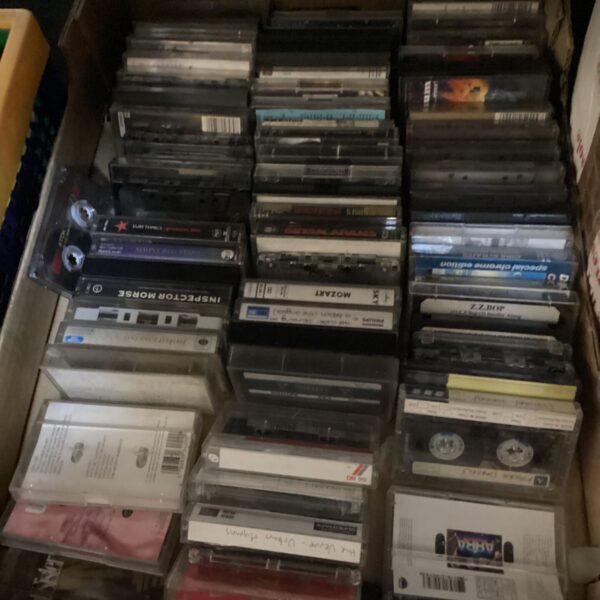 Tray of mixed tape cassettes including Abba and Mozart.