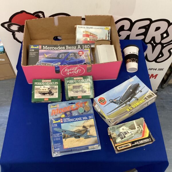 Lot of vintage model aircraft and cars, including a Revell kit.