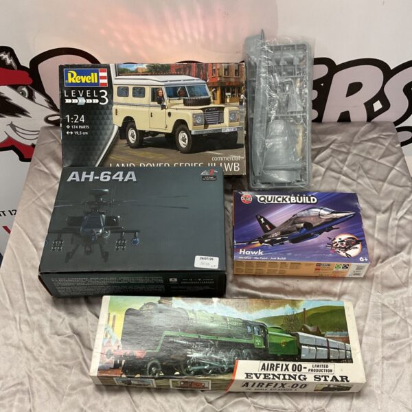Group of unbuilt model kits including Revell Land Rover and Airfix Apache.