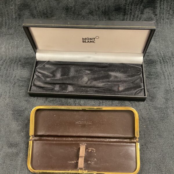 Vintage Montblanc pen case in dark brown leather, closed view.