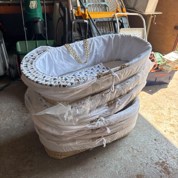 Job lot of woven Kindervalley Moses baskets for babies.