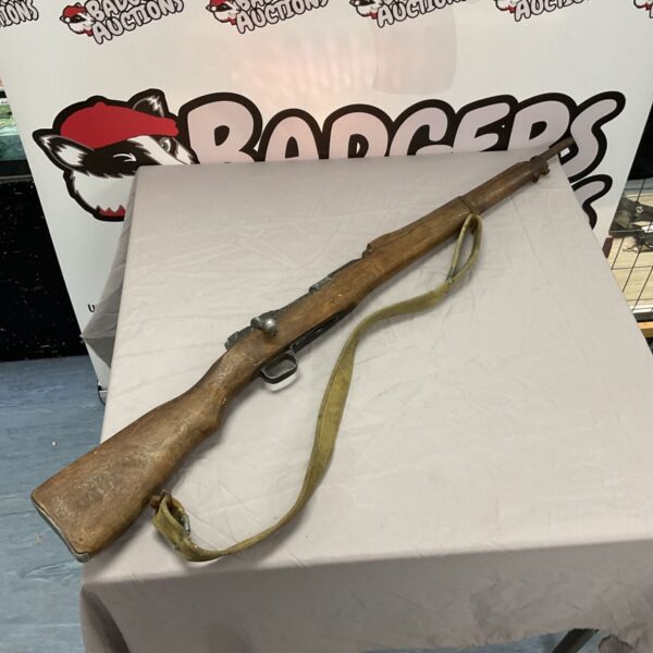 Vintage movie prop bolt action rifle for collectors.