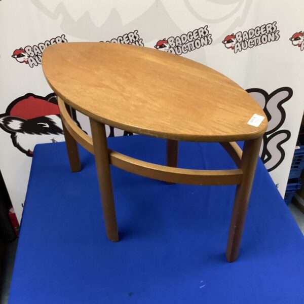 Vintage Nathan mid-century teak side table with eye shape.