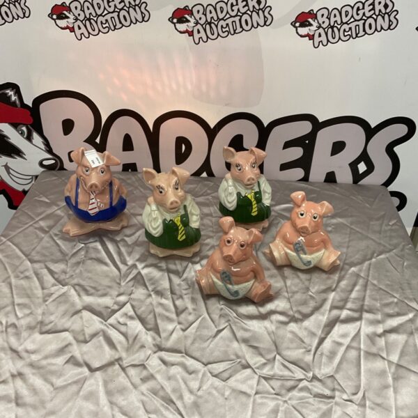 Group of four vintage NatWest ceramic piggy banks.