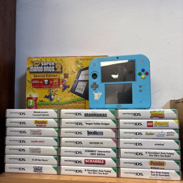 Nintendo 2DS Pokémon bundle with 21 games and Super Mario Bros box.