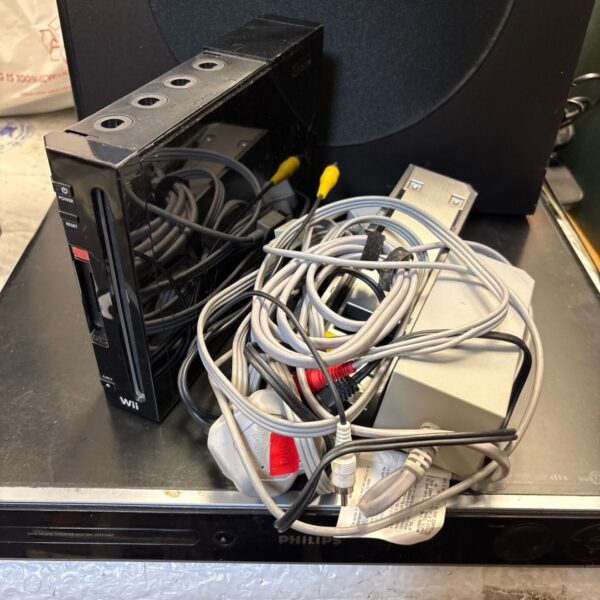 Nintendo Wii console with cables for retro gaming setup.