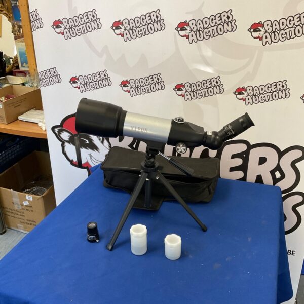 Nipon Shooters spotting scope with case and accessories.