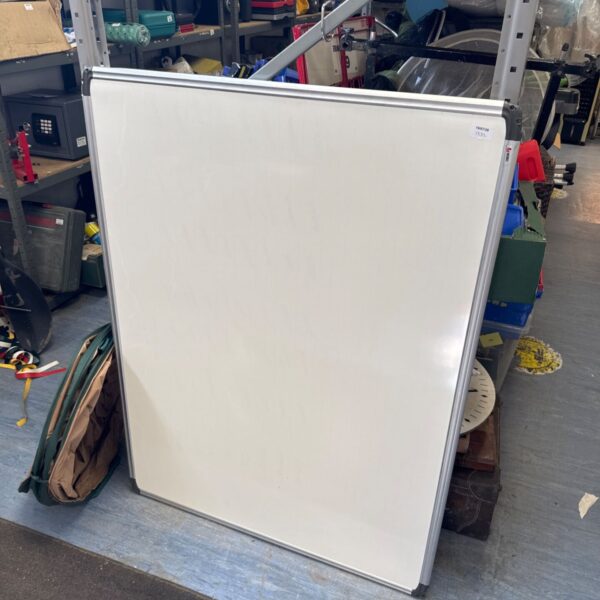 Large Nobo office whiteboard with a metal frame, showing signs of use.