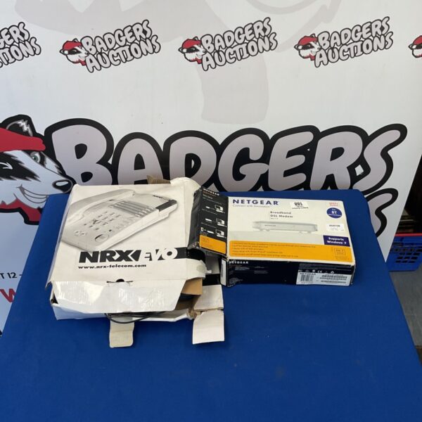 Notifier NRXI-REP fire alarm repeater and Netgear DSL modem.