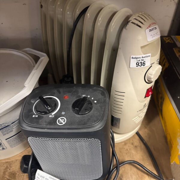 White oil filled radiator fan heater with dial control.