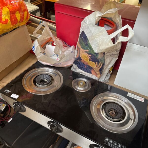 Onj twin burner gas stove with gas bottle and accessories.