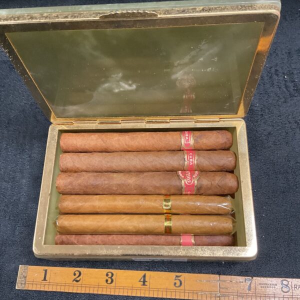 Vintage onyx cigar box with Quintero Havana and Castella cigars inside.