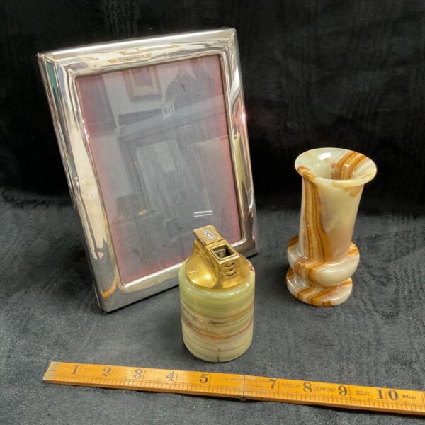Vintage onyx and silver photo frame lot with lighter and vase.