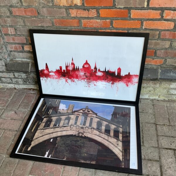 Framed watercolour print of the Oxford city skyline.