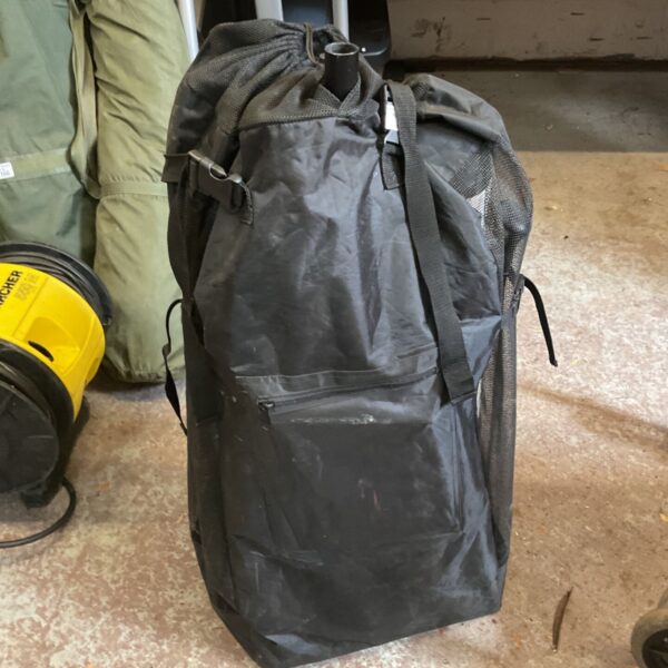 Black paddle board bag with carrying straps for water sports.