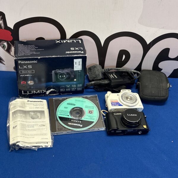 Boxed Panasonic Lumix LX5 digital camera with accessories.