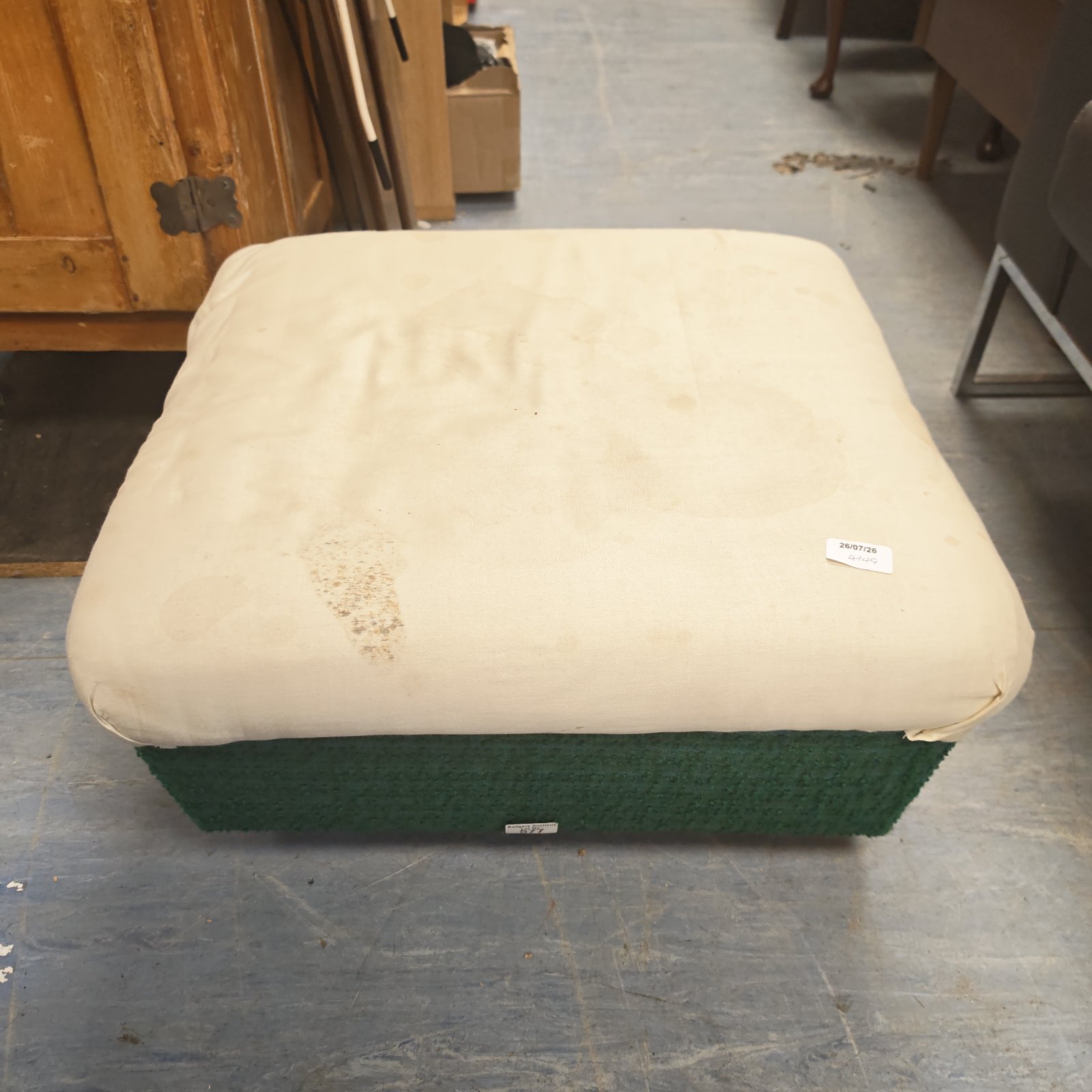Vintage Parker Knoll footstool with casters, mid century modern style.