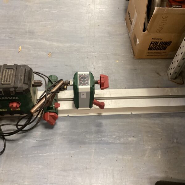 Parkside wood turning lathe with sliding bed and motor unit.