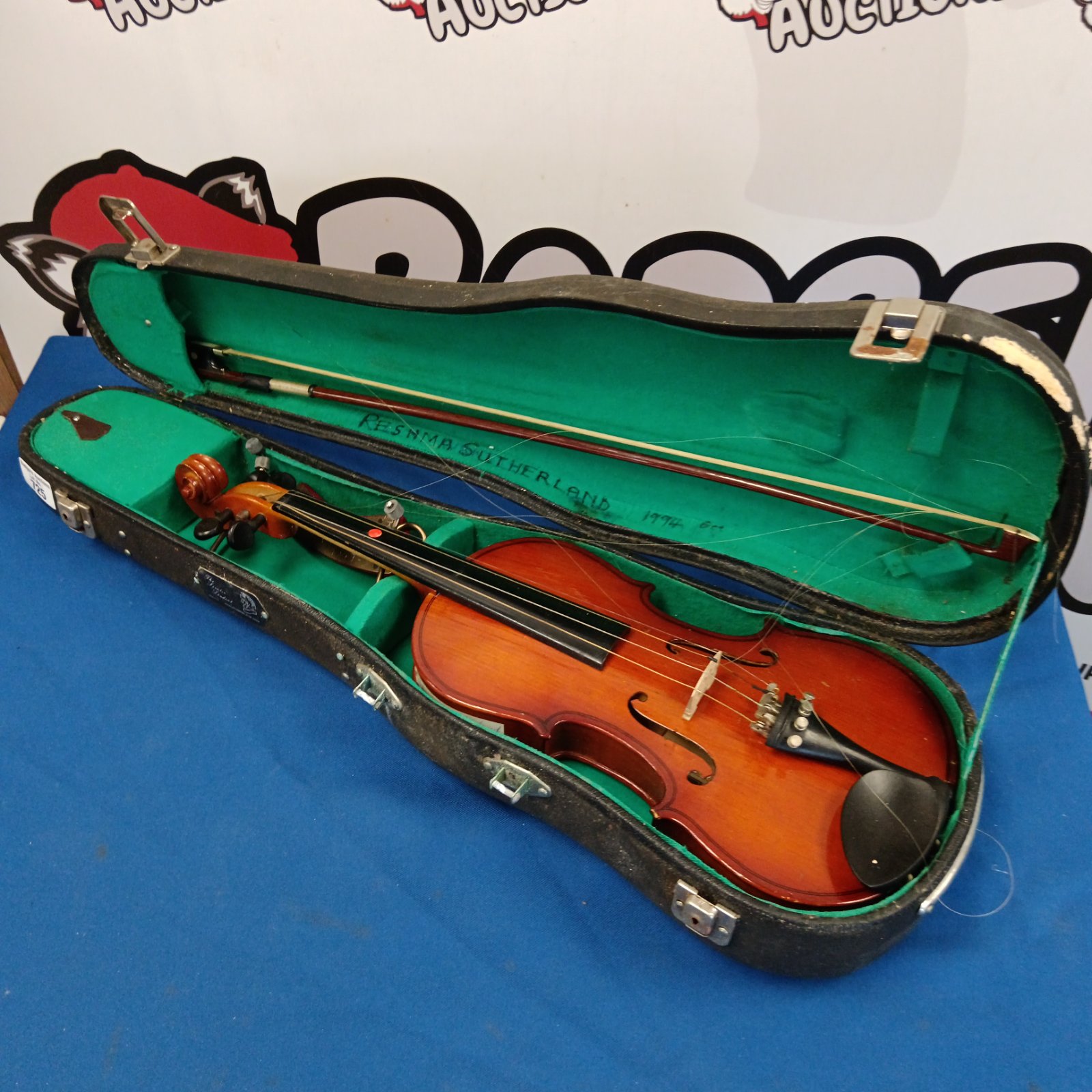 Vintage Parrot violin in open case with bow.