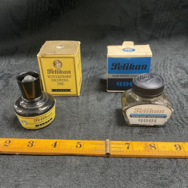 Vintage Pelican ink bottles, including 4001 ink, for collectors.