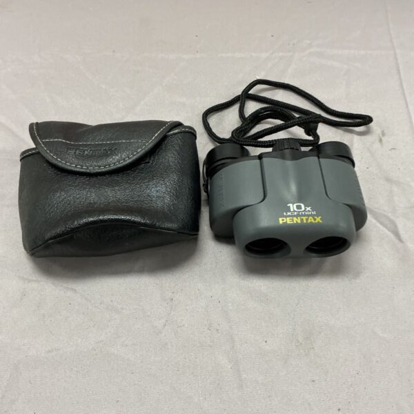 Pentax 10x UCFmini binoculars with protective case, ideal for outdoor activities.