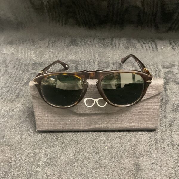 Vintage Persol tortoise shell sunglasses with case.