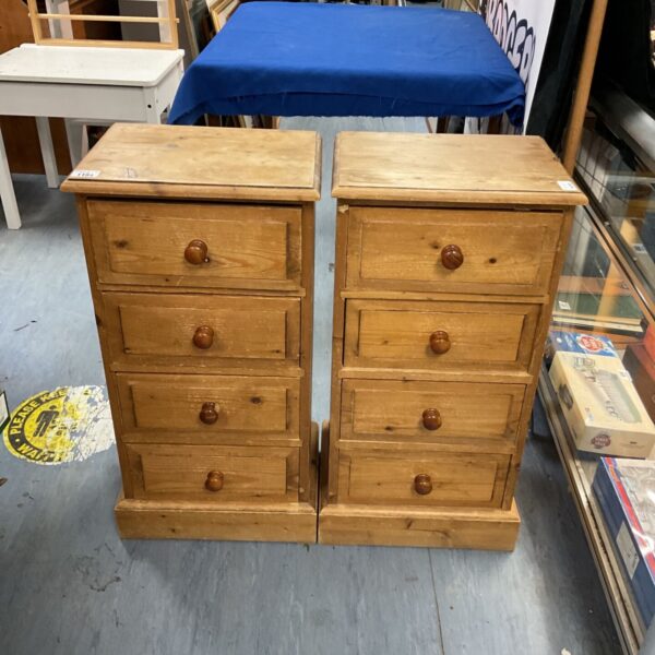 Vintage pine bedside cabinets with four drawers, rustic bedroom furniture.