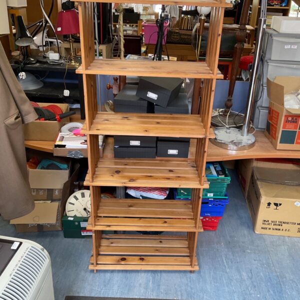 Vintage pine shelving unit for home storage and display.