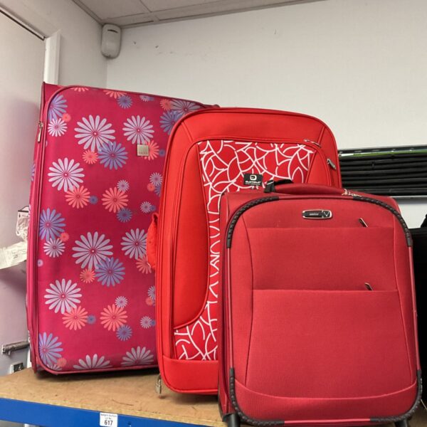 Pink floral travel case from a lot of vintage luggage.