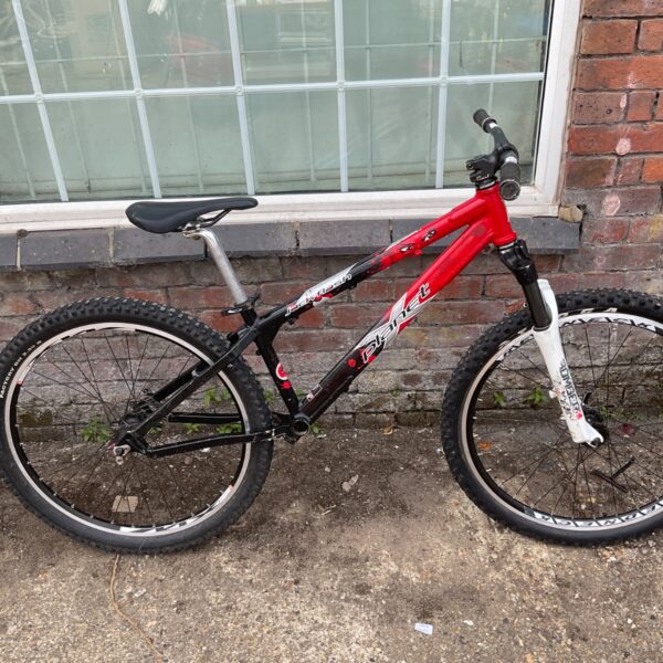 Red Planet X dirt jump bike, ideal for off-road cycling.
