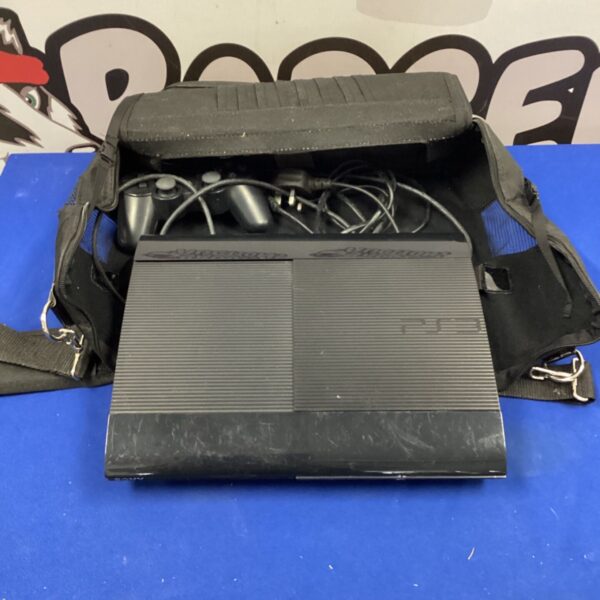 Black Sony PlayStation 3 console with cables and carrying bag.