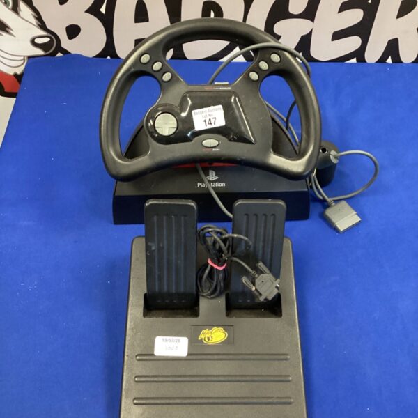 Mad Catz Playstation steering wheel with pedals and broken shifter.