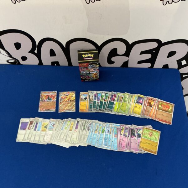 Pokémon cards collection in a Chaos Rising box for collectors.