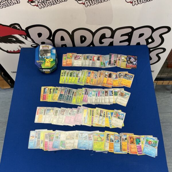 Pokémon trading card collection with Pokémon Go tin for collectors.