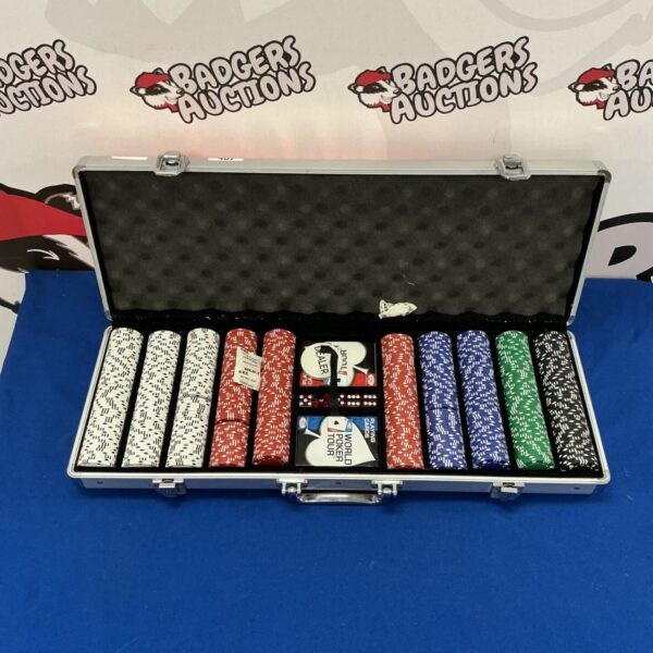 Vintage poker chip set with dice and cards in a case.
