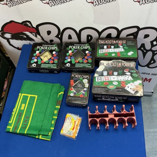Poker chip set with green mat for casino card games.