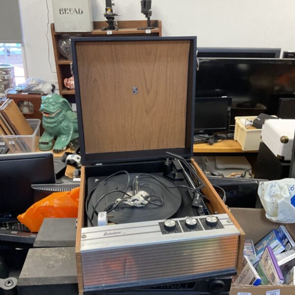 Vintage Portadyne RP22 portable record player in brown and cream.