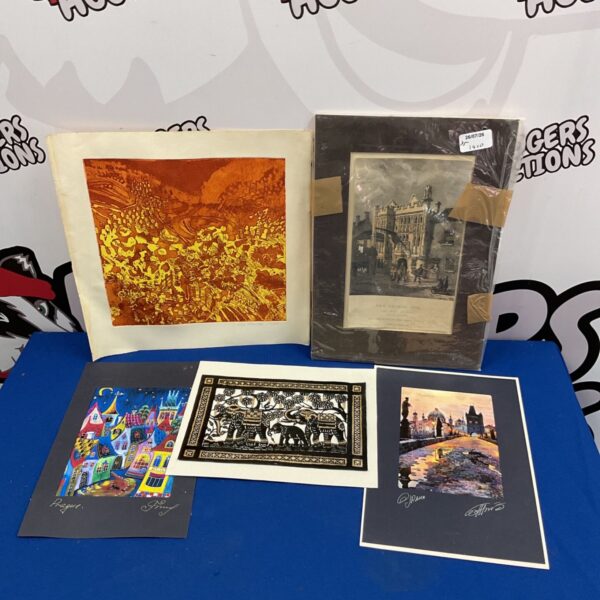 Vintage collection of Prague street art prints and small artworks.