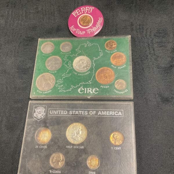 Vintage proof coin sets from Eire and the United States with badge.