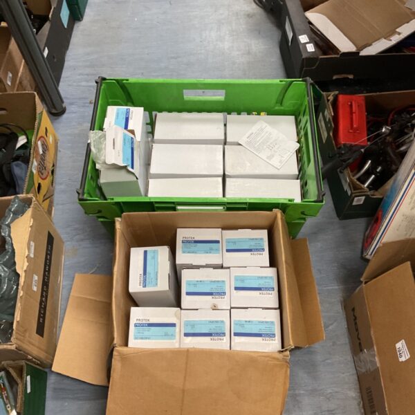 Job lot of Protek electrical switch incomer units in green crates.