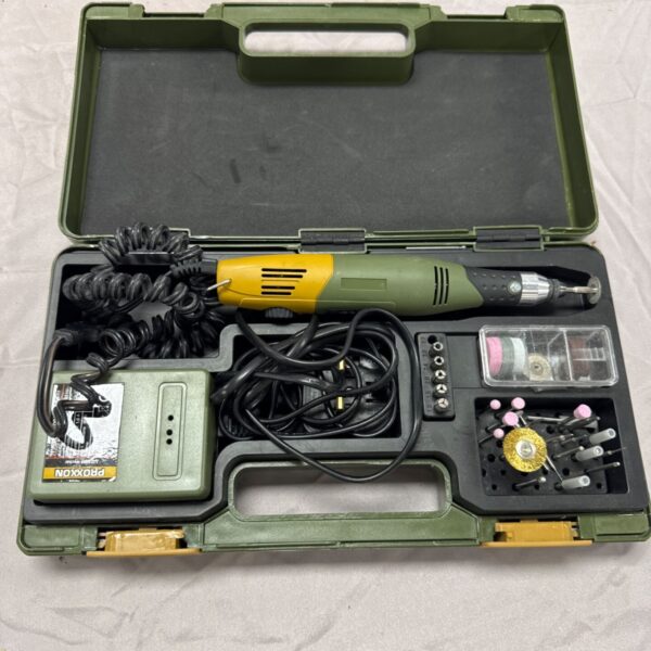 Proxxon 28515 multi tool set in open case with attachments.