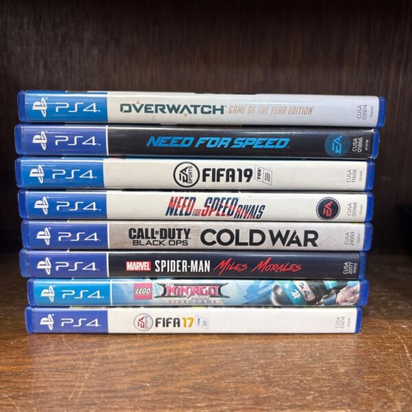 Selection of pre-owned PS4 games including Overwatch and FIFA 19.