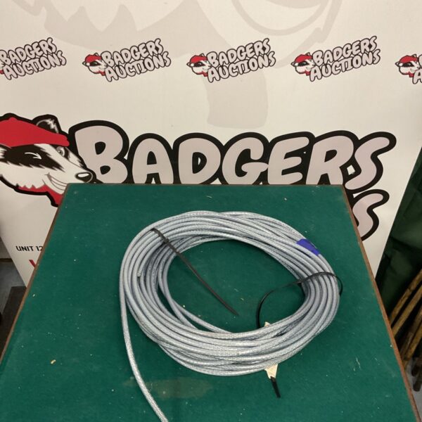 PVC coated steel wire rope, coiled and ready for use.