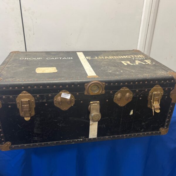 Vintage RAF Group Captain trunk with visible markings and clasps.