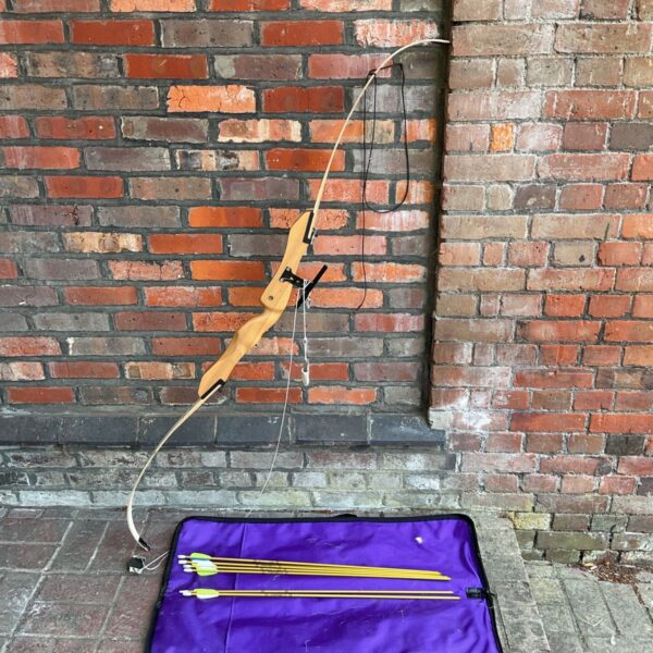 Ragim Victory longbow with gold stalker arrows in a case.