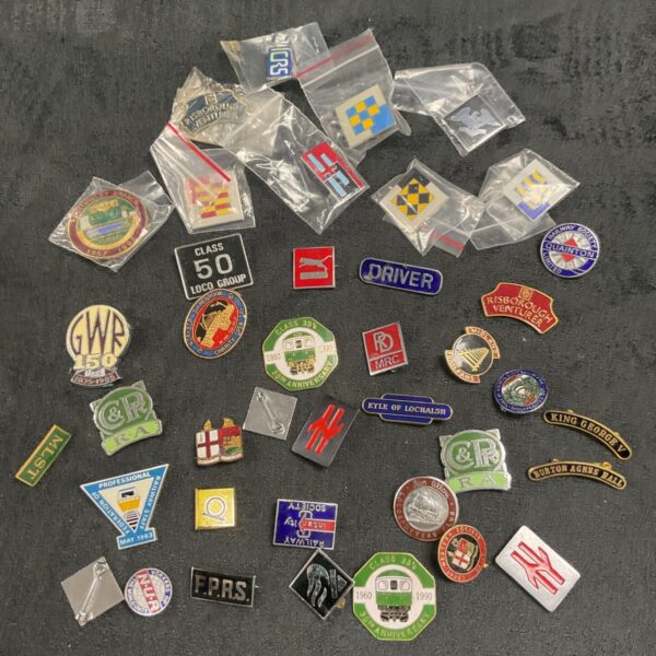 Assorted vintage railway pin badges, a collection of railwayana.