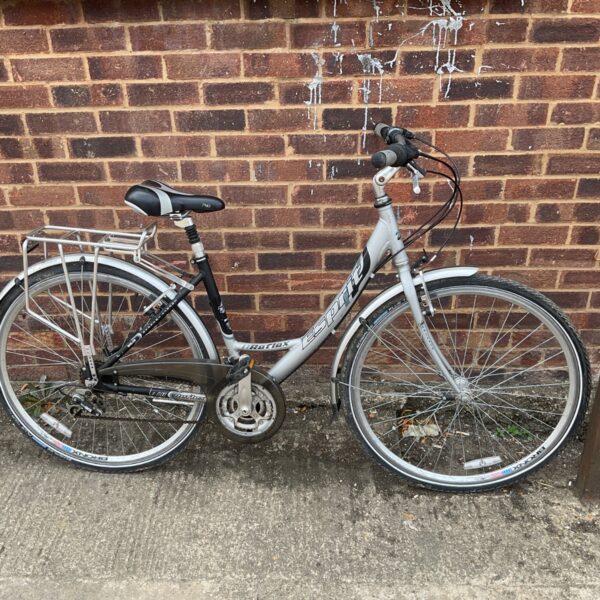 Silver Reflex Esprit ladies hybrid bicycle, side view.