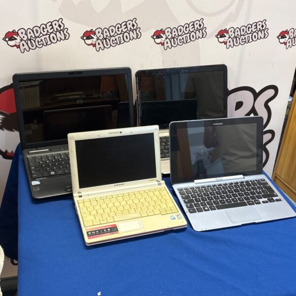 Lot of four repair laptops including HP and Acer models.